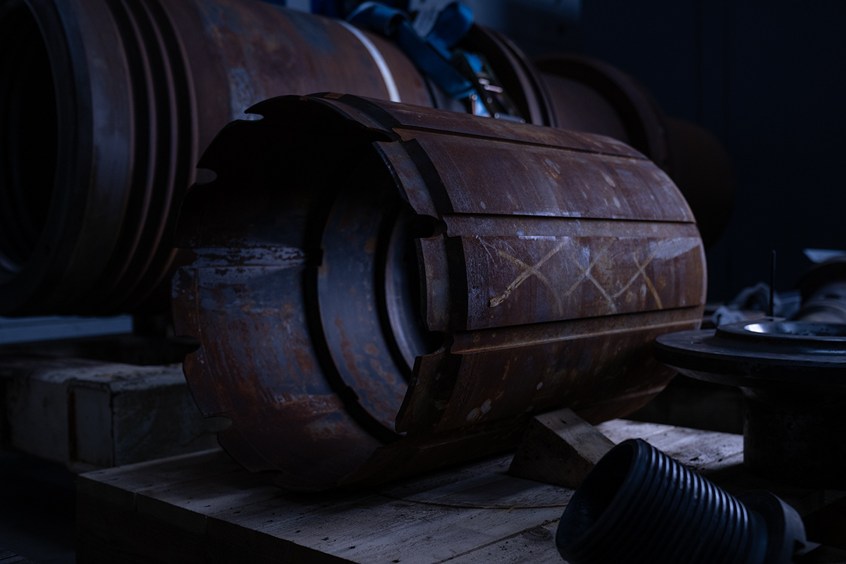 Large machined housing component on workshop floor