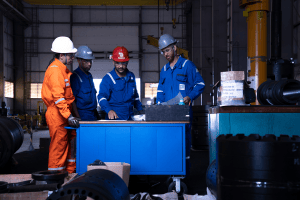 industrial photographer Engineers and technicians reviewing plans