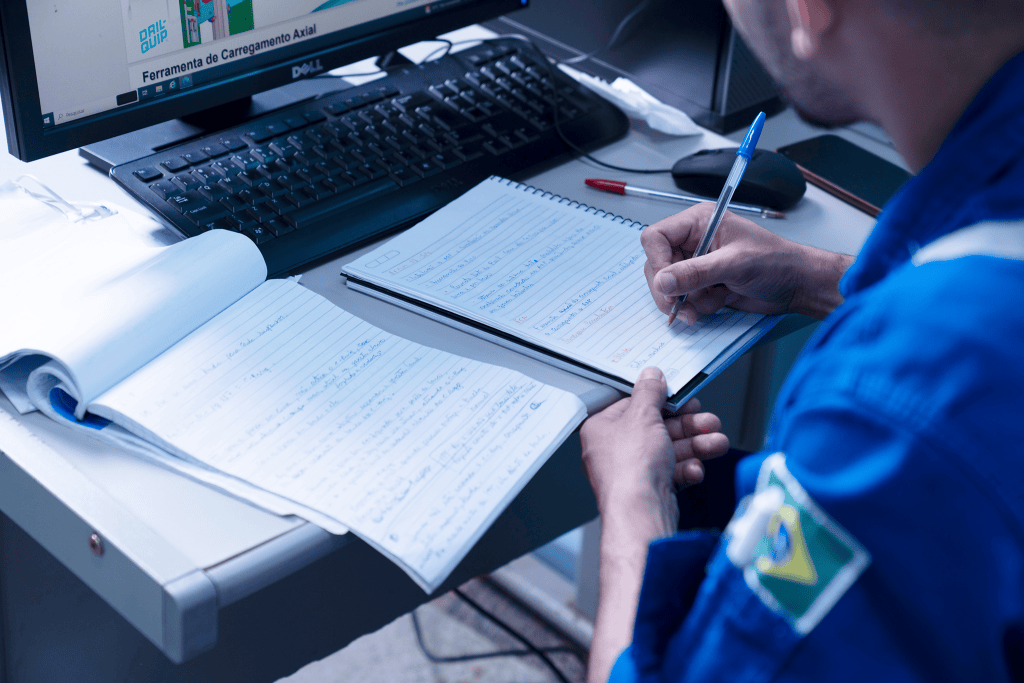 industrial photographer Technician reviewing engineering documentation